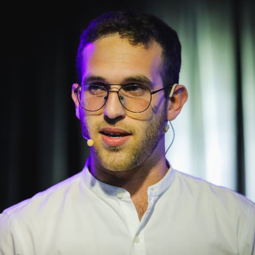 Head shot of Yuval Keshtcher, UX Writing Hub founder
